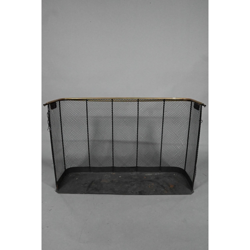 890 - A large antique brass framed steel mesh nursery fireguard, with extending brass rail drying rail, 10... 