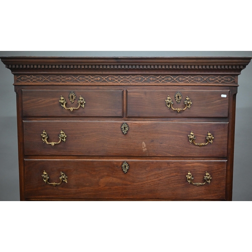 898 - A George III mahogany chest on chest, the dentil moulded cornice over a blind fret frieze, two short... 