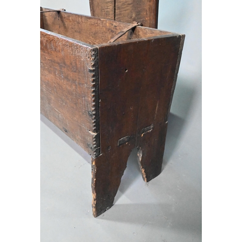 903 - A 17th century oak five-plank coffer, the top with chip carved edges and iron plate repairs over an ... 