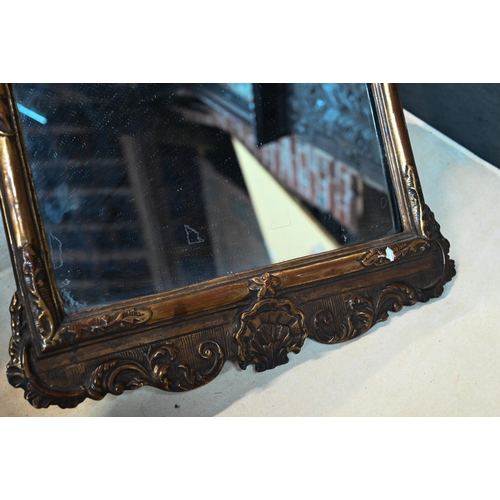 921 - An antique giltwood and gesso mirror, 62 cm x 40 cm