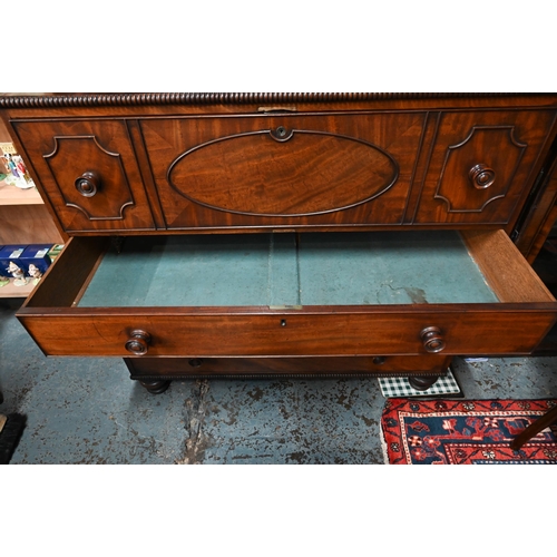 927 - A Regency mahogany secrétaire library bookcase, the associated two door astragal glazed cabin... 