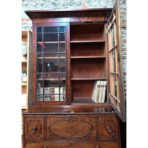 927 - A Regency mahogany secrétaire library bookcase, the associated two door astragal glazed cabin... 