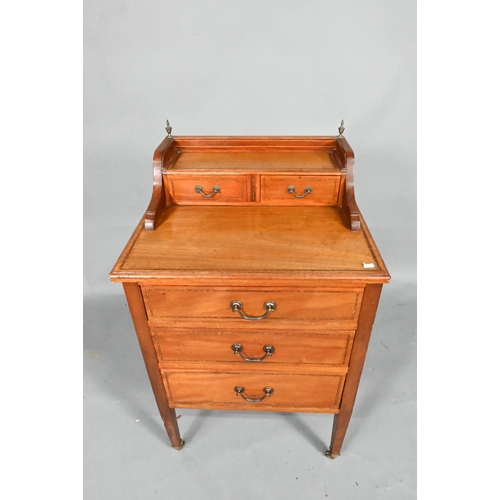 929 - An inlaid mahogany chest with two drawer stage-back over three long drawers, raised on square taperi... 