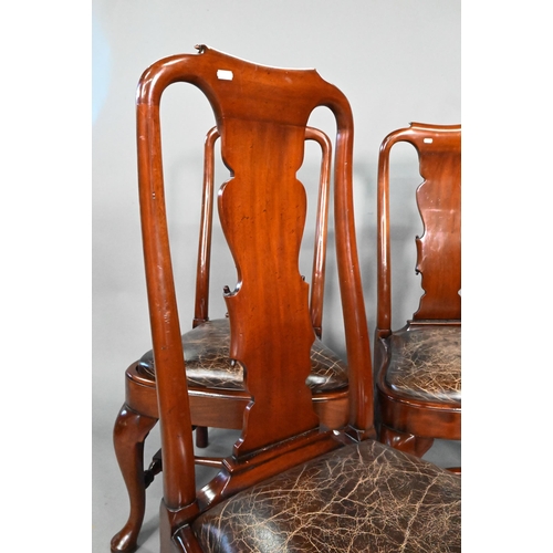 931 - A set of ten Queen Anne style dining chairs, with antiqued brown leather seat pads, raised on cabrio... 