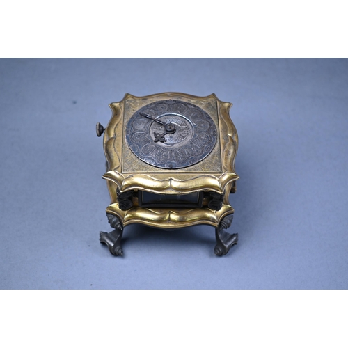 948 - Johann Ernest Weichenthal, Dantzig, an 18th century horizontal gilded brass table clock, the chain f... 