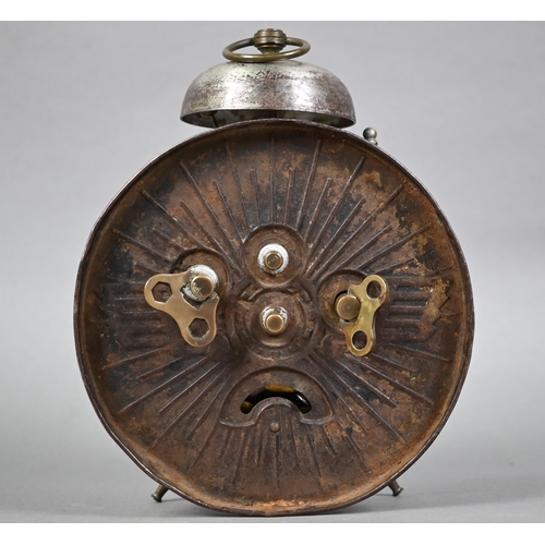 949 - A WWII period Nuremburg rally clockwork alarm clock, the dial with portrait of Adolf Hitler before a... 