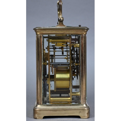 954 - A traditional brass 8-day carriage clock, the twin drum hour repeat movement white enamelled with ro... 