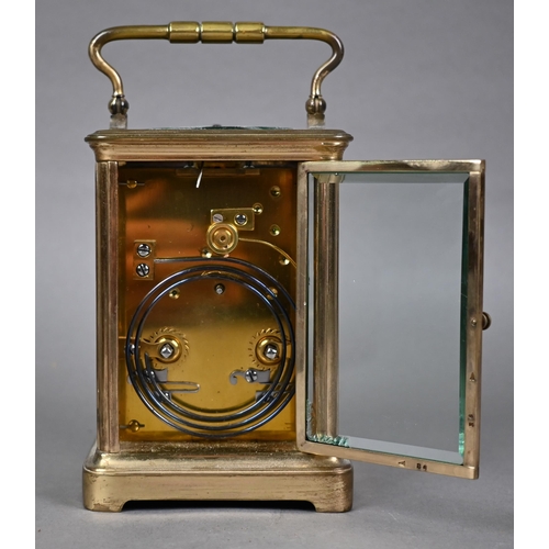 954 - A traditional brass 8-day carriage clock, the twin drum hour repeat movement white enamelled with ro... 