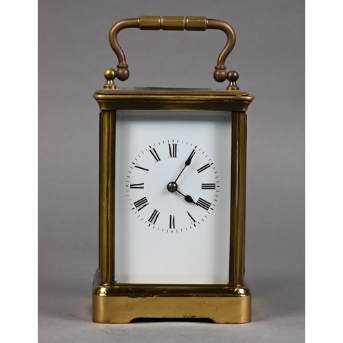 957 - A traditional brass carriage clock, the 8-day twin drum movement with white enamelled dial (unsigned... 