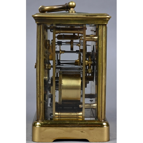 957 - A traditional brass carriage clock, the 8-day twin drum movement with white enamelled dial (unsigned... 