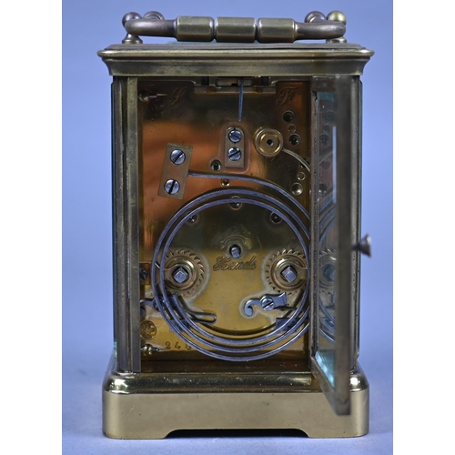 957 - A traditional brass carriage clock, the 8-day twin drum movement with white enamelled dial (unsigned... 