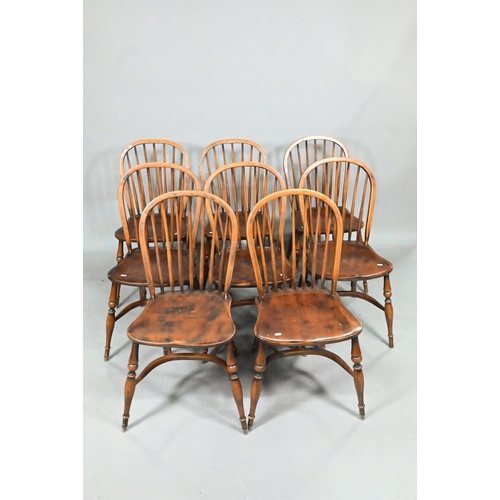 963 - A set of eight late 19th century elm and ash spindle back chairs with crinoline stretchers (8)