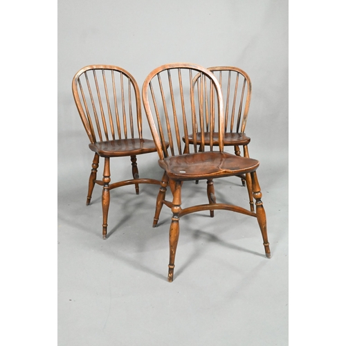 963 - A set of eight late 19th century elm and ash spindle back chairs with crinoline stretchers (8)