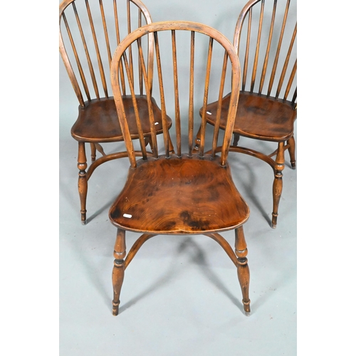 963 - A set of eight late 19th century elm and ash spindle back chairs with crinoline stretchers (8)