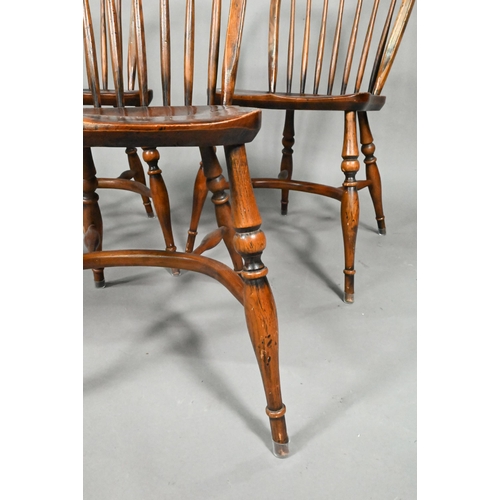 963 - A set of eight late 19th century elm and ash spindle back chairs with crinoline stretchers (8)