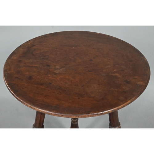 965 - A late Arts & Crafts circular occasional table, raised on three turned bamboo style legs united ... 