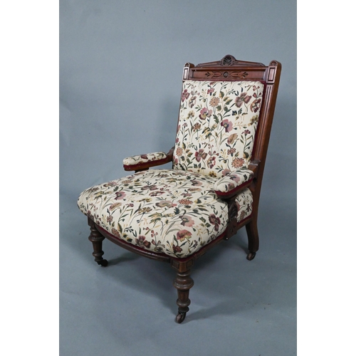 966 - A late 19th/20th century walnut framed and moulded open armchair with autumn leaf and floral pattern... 