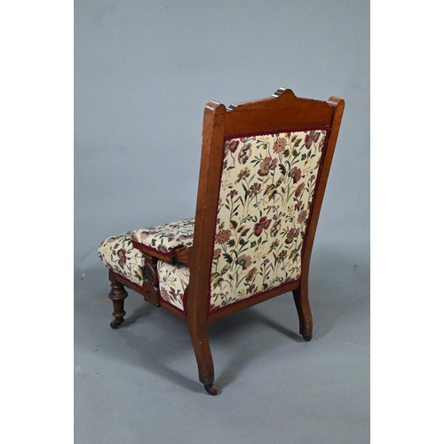 966 - A late 19th/20th century walnut framed and moulded open armchair with autumn leaf and floral pattern... 