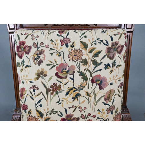 966 - A late 19th/20th century walnut framed and moulded open armchair with autumn leaf and floral pattern... 