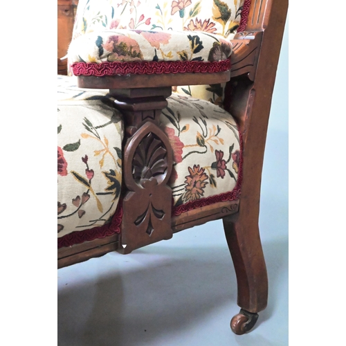 966 - A late 19th/20th century walnut framed and moulded open armchair with autumn leaf and floral pattern... 