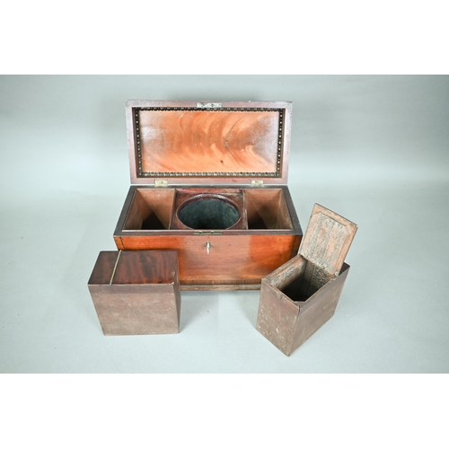 969 - A Regency mahogany sarcophagus form tea caddy, the interior with twin lidded boxes flanking a centre... 