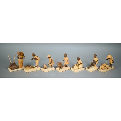 1226 - An African carved and stained wood set of Nativity scene figures - the largest 11 cm