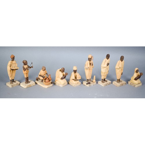 1226 - An African carved and stained wood set of Nativity scene figures - the largest 11 cm