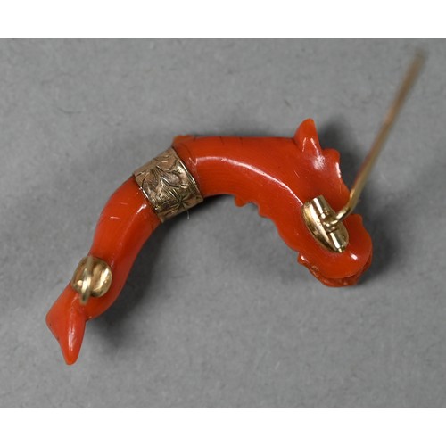 235 - An antique Chinese coral carved dragon yellow metal mounted brooch, 3.5 cm long, 5 g all in