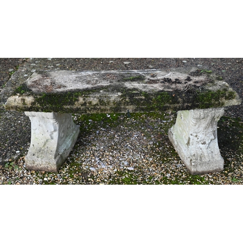 6 - A weathered three piece cast stone garden bench, 110 cm w x 40 cm x 45 cm h