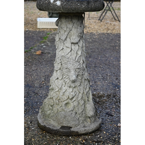 7 - A weathered two piece cast stone bird bath