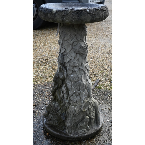 7 - A weathered two piece cast stone bird bath