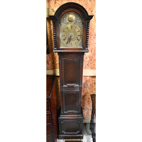 581 - A 1920s eight-day three train oak longcase clock in the 18th century manner, with brass dial a/f (pe... 