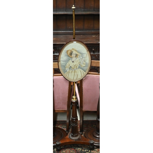 619 - A Regency rosewood pole screen, the adjustable rise and fall pole with needlepoint panel on a trifor... 