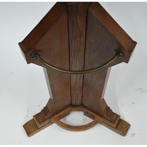 276 - An Arts & Crafts period oak hall stand with brass hooks and stick/umbrella retaining brackets, o... 