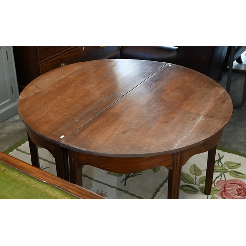 477 - A 19th century mahogany dining table with pair of demi-lune ends united by drop leaf central section... 