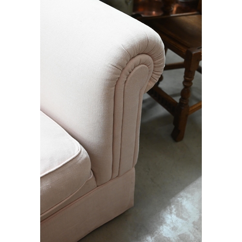 490 - A country house Chesterfield deep seated sofa in pale dusky pink linen upholstery, 210 cm wide x 120... 