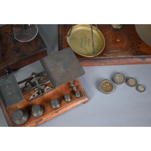 193 - A 19th century set of brass and steel scales on mahogany base with drawer, 37 cm high to/w a large s... 