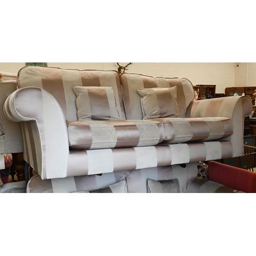 443 - A scoll arm three seater sofa with cream and gold striped fabric upholstery on hardwood legs (front ... 