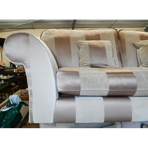 443 - A scoll arm three seater sofa with cream and gold striped fabric upholstery on hardwood legs (front ... 