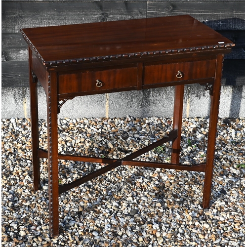 394 - A Chippendale style mahogany card table with folding top over two drawers, 77 cm wide x 42 cm deep x... 