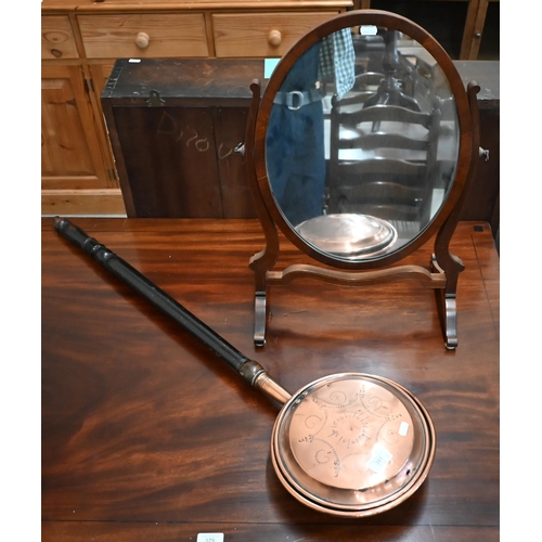 401 - # Edwardian walnut framed oval dressing table mirror, 40 cm w x 58 cm h to/w an antique engraved cop... 