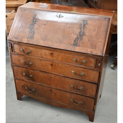 402 - A Georgian mahogany fall front bureau with fitted interior and four long graduating drawers standing... 