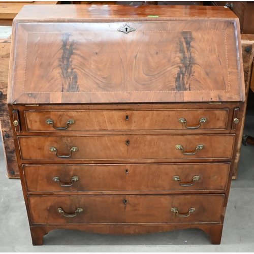 402 - A Georgian mahogany fall front bureau with fitted interior and four long graduating drawers standing... 