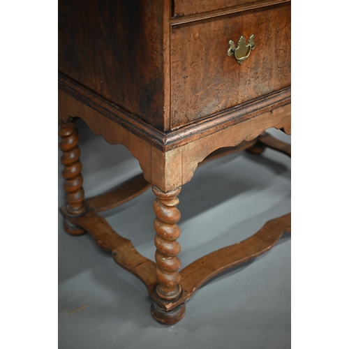 254 - An 18th century walnut chest on stand, with two short over three long graduated drawers with brass p... 