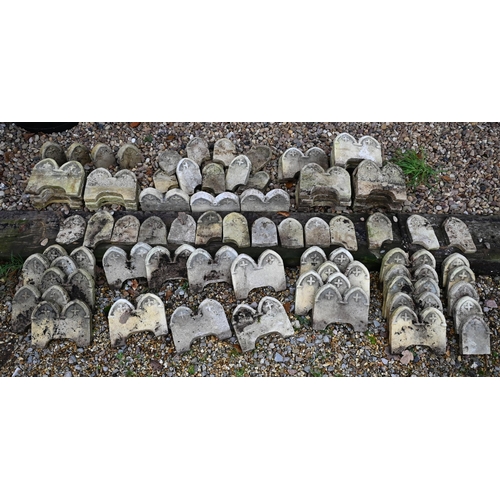 15 - A quantity of weathered cast stone Gothic arched style garden edging tiles, approx. 50 double arched... 