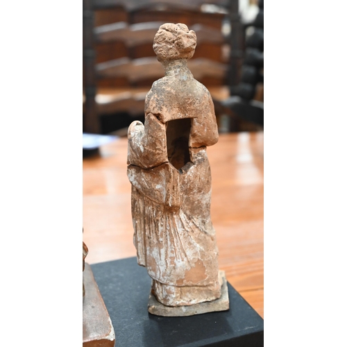 164 - Antiquity terracotta female figure in the Tanagra manner with vestigial slip draped robe, on square ... 