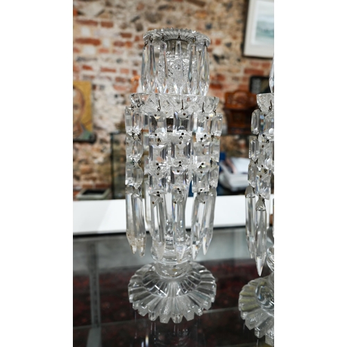 168 - Pair of antique cut glass candlesticks, hung with facetted prism drops, 34 cm high (one a/f)