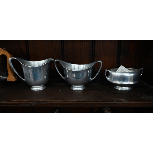 203 - Five pieces of Picquot Ware aluminium alloy tea wares, including tea pot, hot water jug, milk and su... 