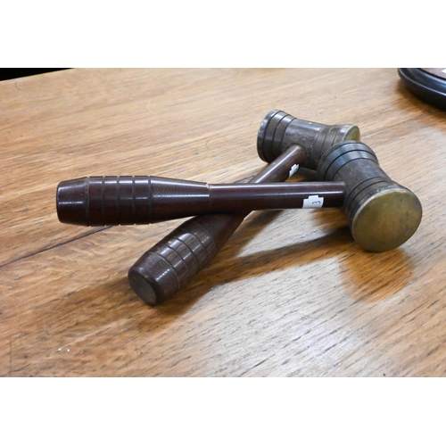 219 - Two brass-mounted turned wood gavels, 17 cm