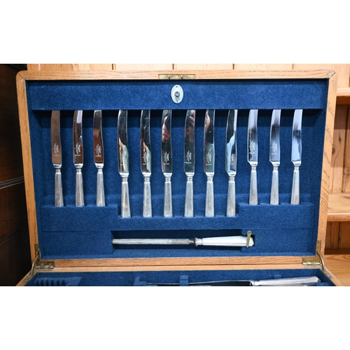 247 - Mappin & Webb oak canteen containing a set of Mappin Plate flatware and cutlery etc